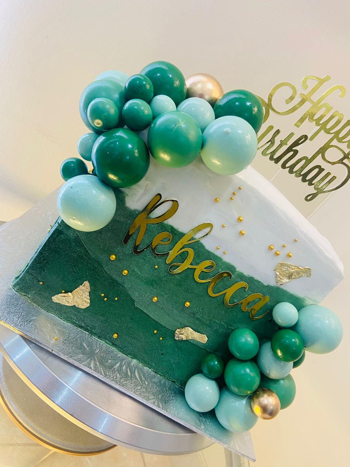 Gâteau vert à guirlande de ballons